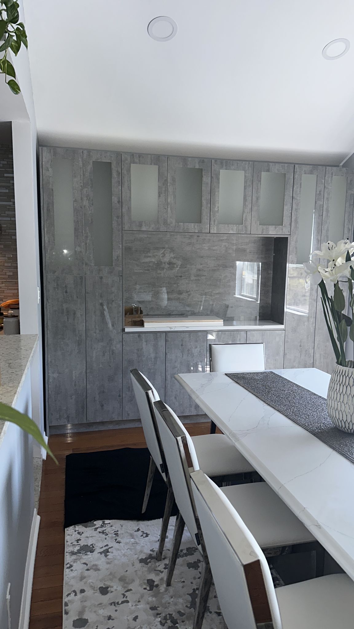 Urban Cement sample 022 used on completed dining room cabinetry with glass display doors