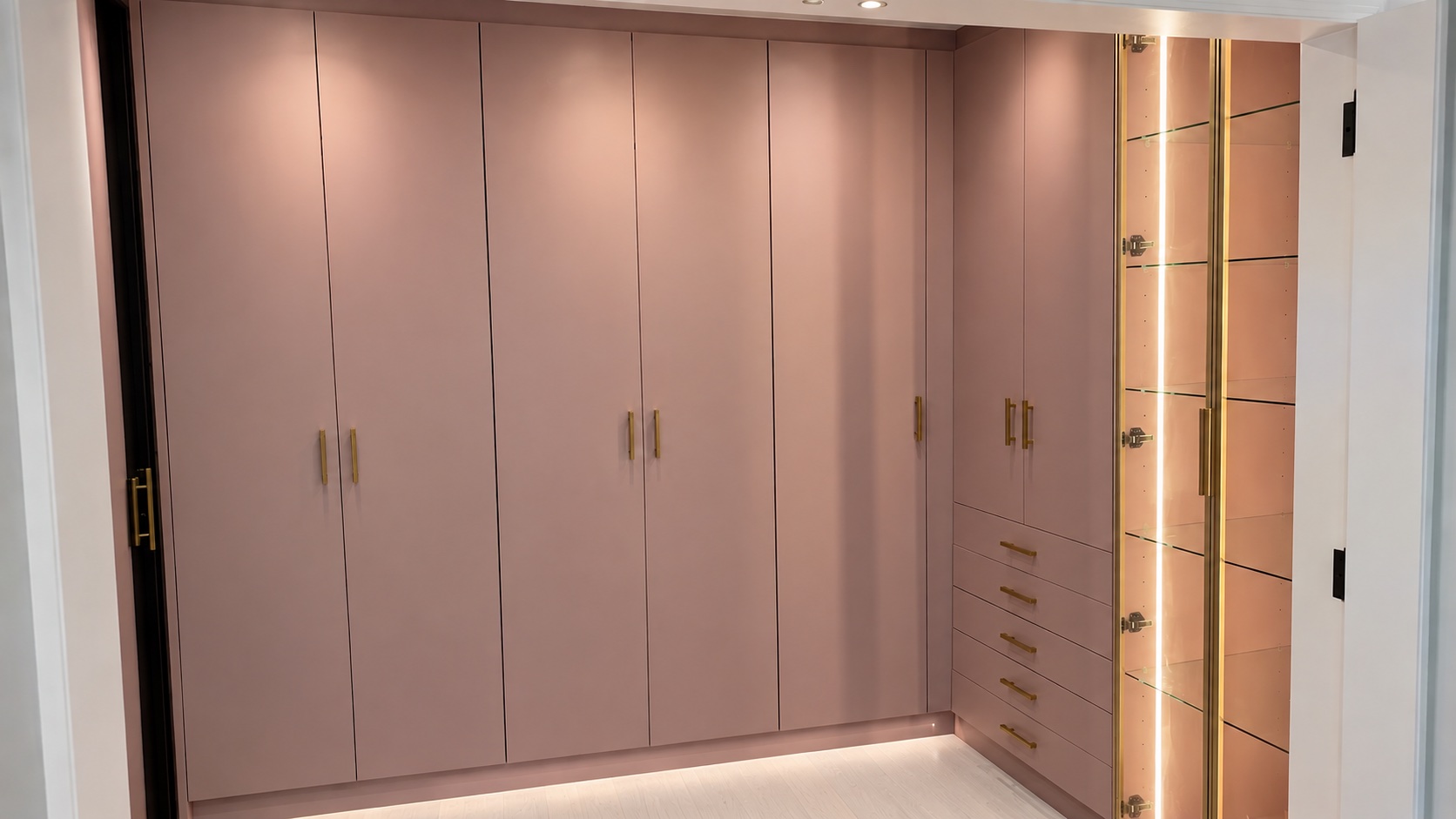 Sample 5005 used on a custom closet with gold hardware and an illuminated glass display cabinet