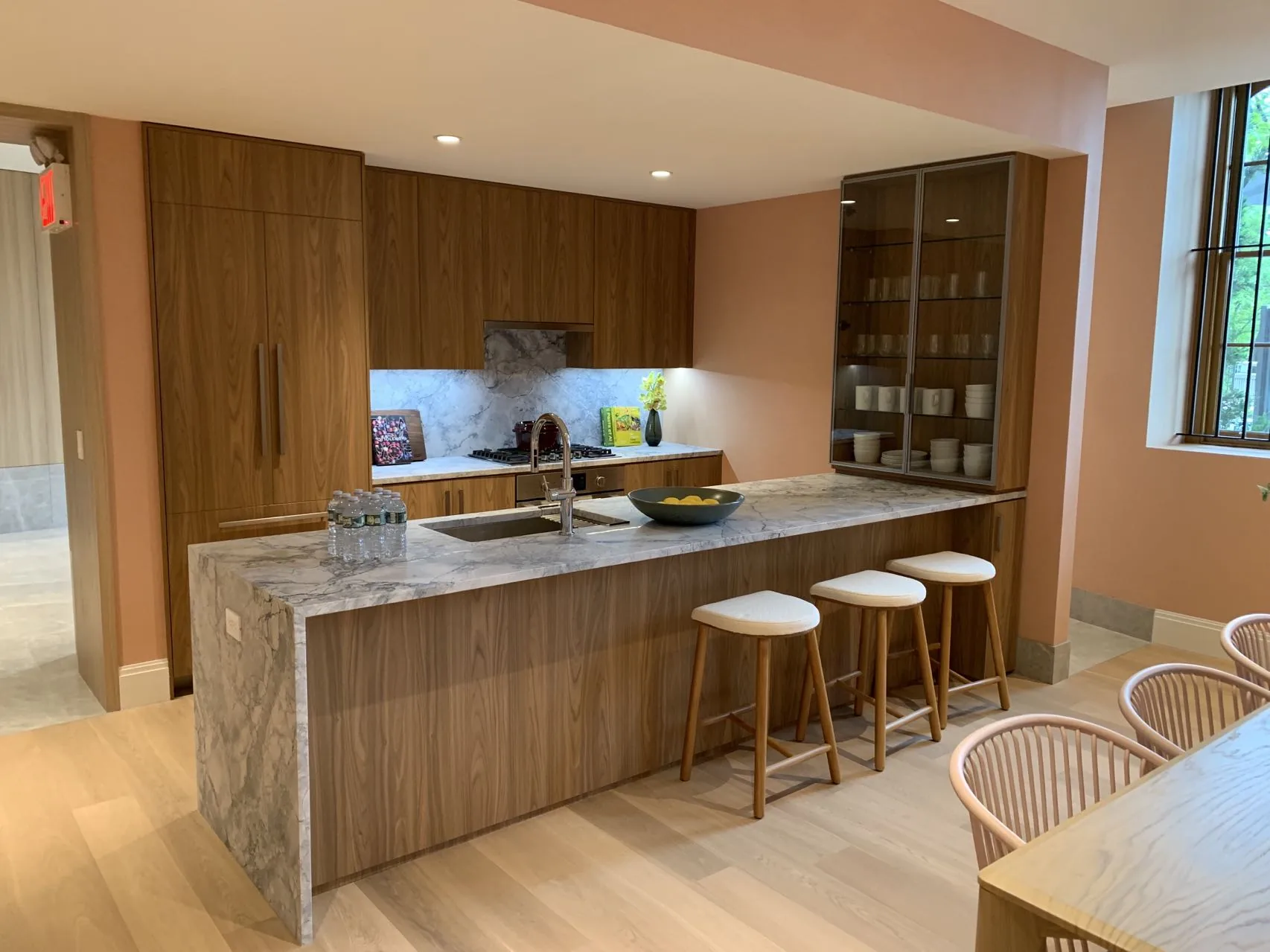 Natural wood kitchen with a peninsula and open display storage